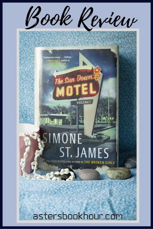The pinterest image for The Sun Down Motel by Simone St. James book review. There is a blue floral print background with the novel centered in the middle and the cover facing the front. The words book review are in fake cursive over the top. The words book review are in fake cursive over the top.