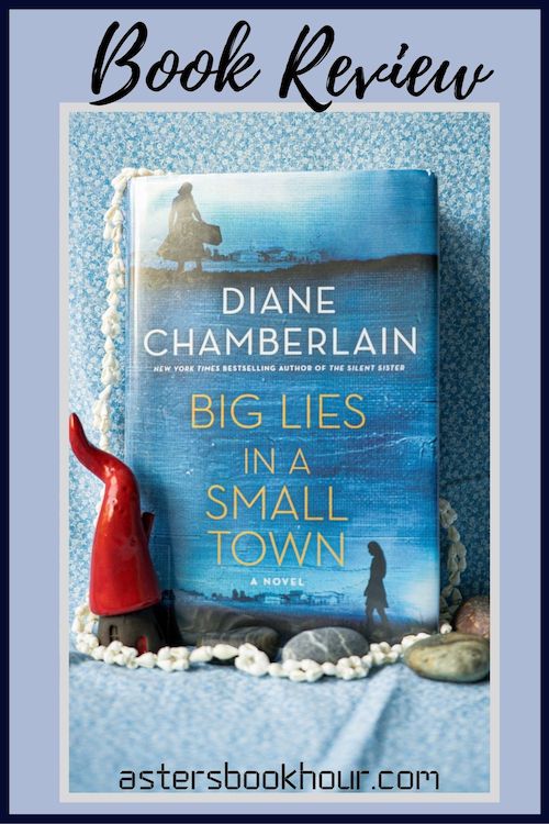 The pinterest image for Big Lies In A Small Town by Diane Chamberlain book review. There is a blue floral print background with the novel centered in the middle and the cover facing the front.