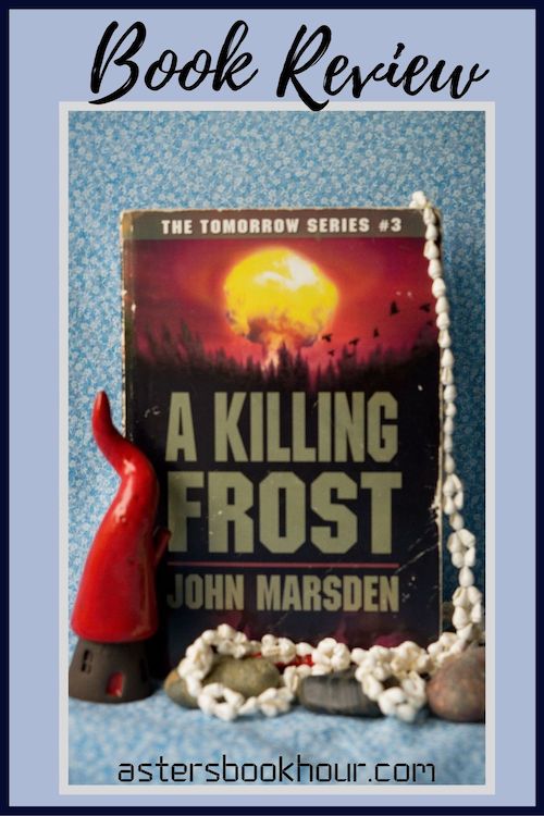 The pinterest image for The Third Day, the Frost by John Marsden book review. There is a blue floral print background with the novel centered in the middle and the cover facing the front.