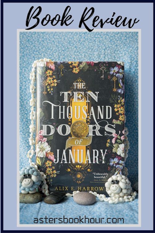 The pinterest image for The Ten Thousand Doors of January by Alix E. Harrow book review. There is a blue floral print background with the novel centered in the middle and the cover facing the front.