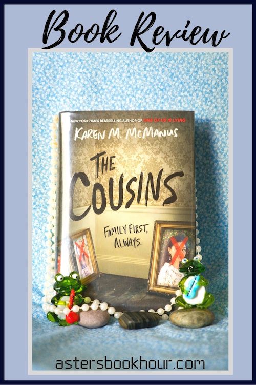 The pinterest image for The Cousins by Karen M. McManus book review. There is a blue floral print background with the novel centered in the middle and the cover facing the front.