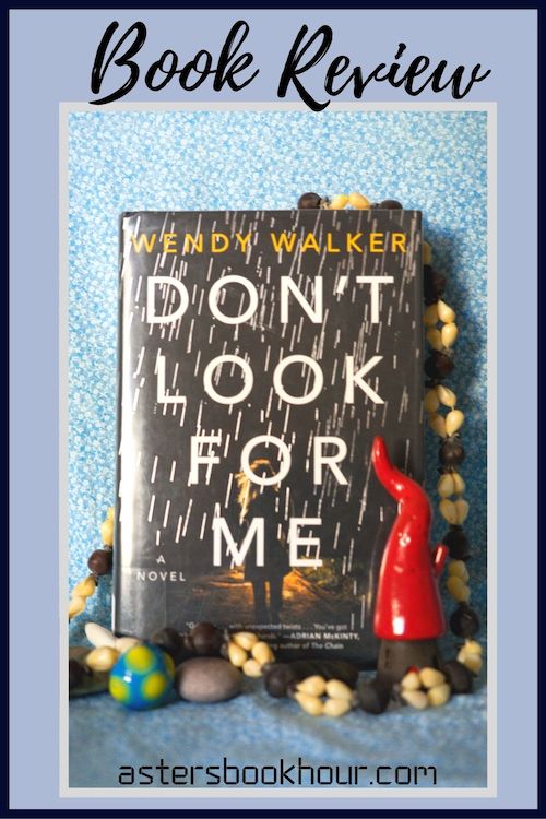 The pinterest image for Don't Look For Me by Wendy Walker book review. There is a blue floral print background with the novel centered in the middle and the cover facing the front.