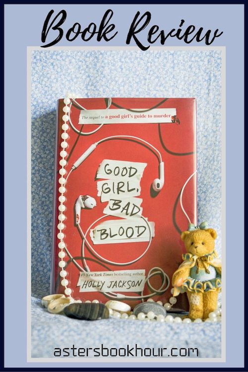 The pinterest image for Good Girl, Bad Blood by Holly Jackson book review. There is a blue floral print background with the novel centered in the middle and the cover facing the front.