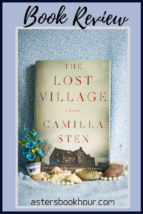 The pinterest image for The Lost Village by Camilla Sten book review. There is a blue floral print background with the novel centered in the middle and the cover facing the front.