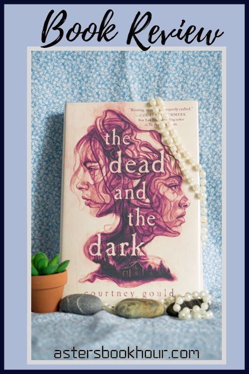 The pinterest image for The Dead and the Dark by Courtney Gould book review. There is a blue floral print background with the novel centered in the middle and the cover facing the front.