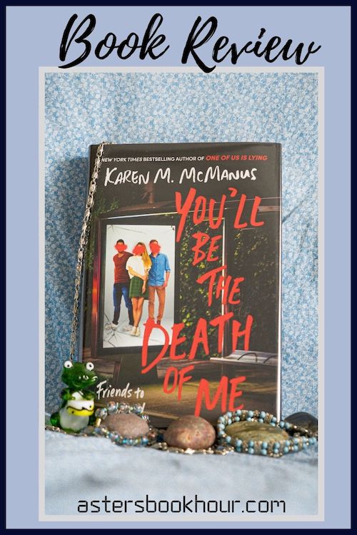 The pinterest image for You'll Be the Death of Me by Karen M. McManus book review. There is a blue floral print background with the novel centered in the middle and the cover facing the front.