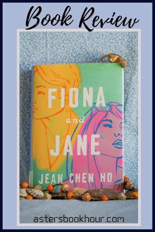The pinterest image for Fiona and Jane by Jean Chen Ho book review. There is a blue floral print background with the novel centered in the middle and the cover facing the front.