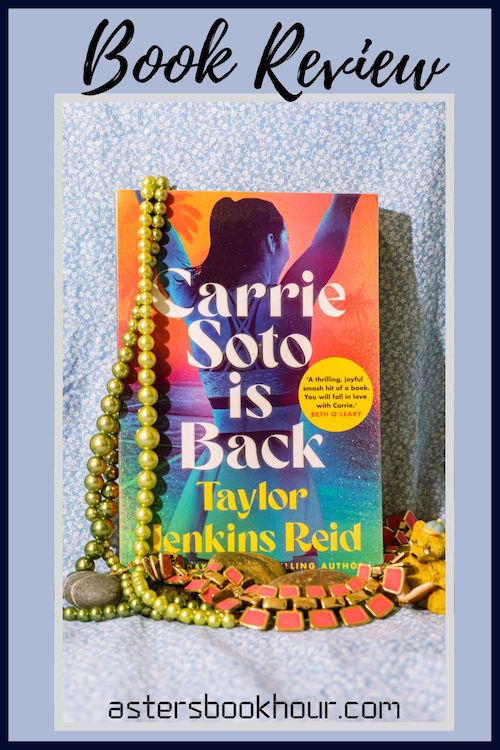 The pinterest image for Carrie Soto is Back by Taylor Jenkins Reid book review. There is a blue floral print background with the novel centered in the middle and the cover facing the front.