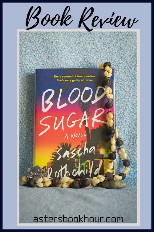 The pinterest image for Blood Sugar by Sascha Rothchild book review. There is a blue floral print background with the novel centered in the middle and the cover facing the front.