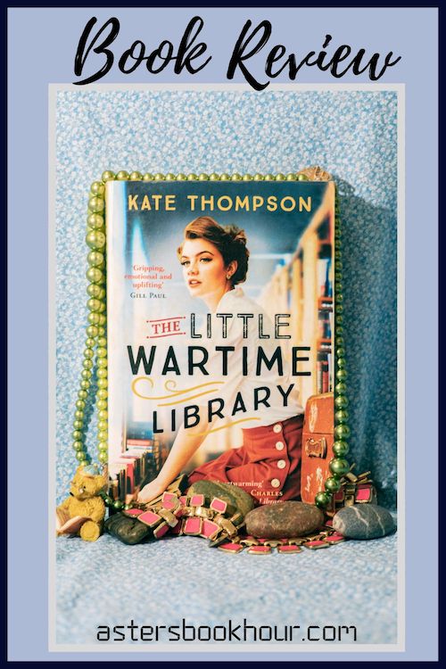 The pinterest image for The Little Wartime Library by Kate Thompson book review. There is a blue floral print background with the novel centered in the middle and the cover facing the front.